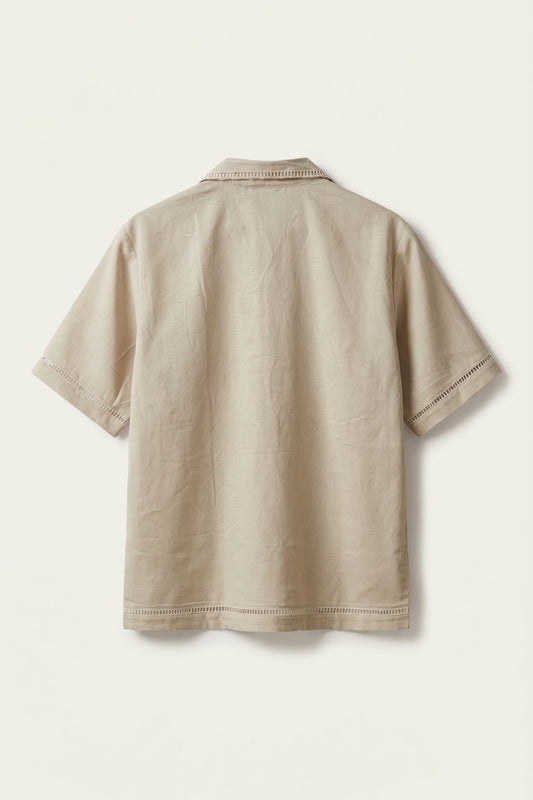 Beige polo shirt on a white background