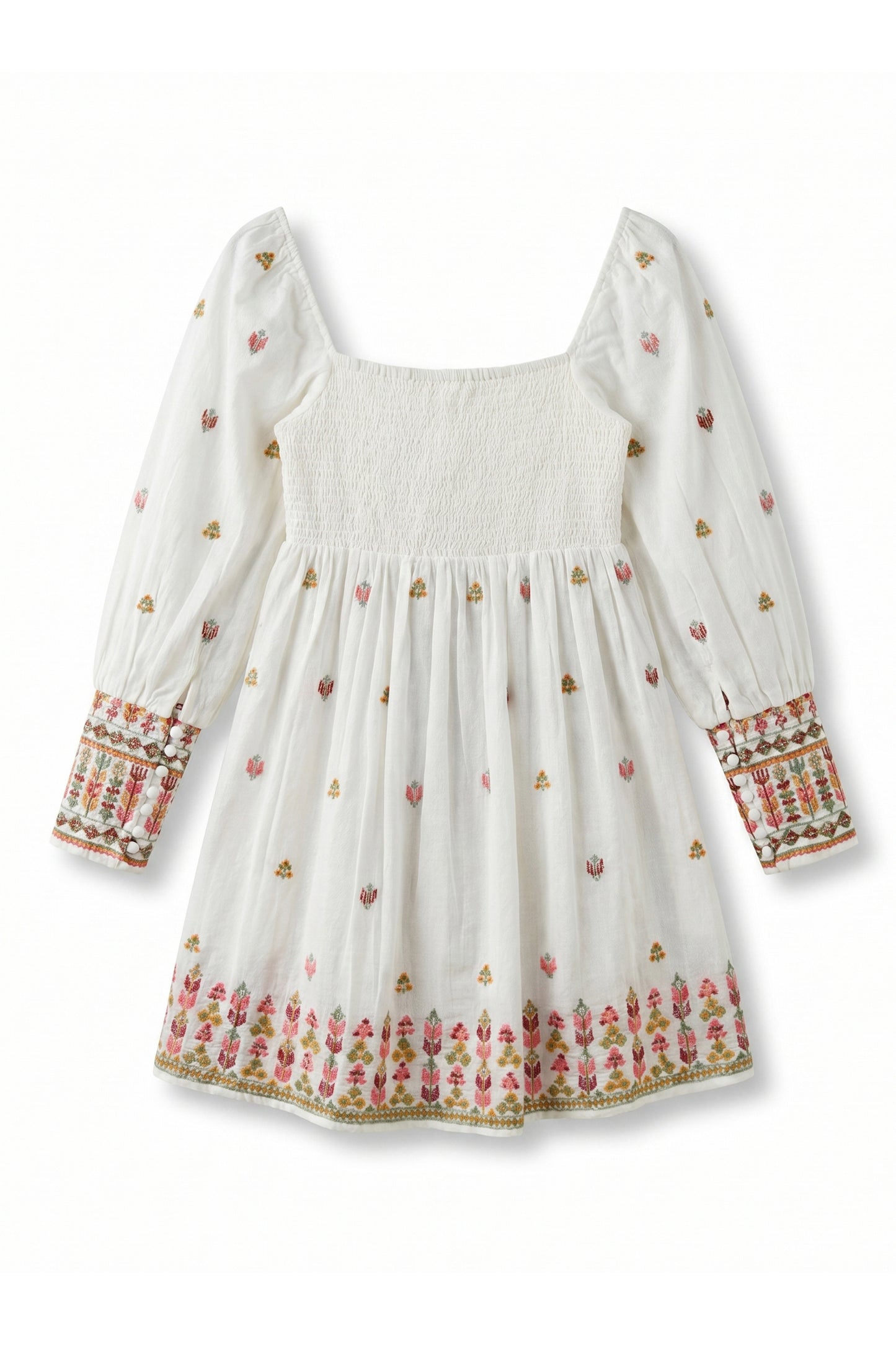 White dress with colorful floral embroidery patterns on a white background