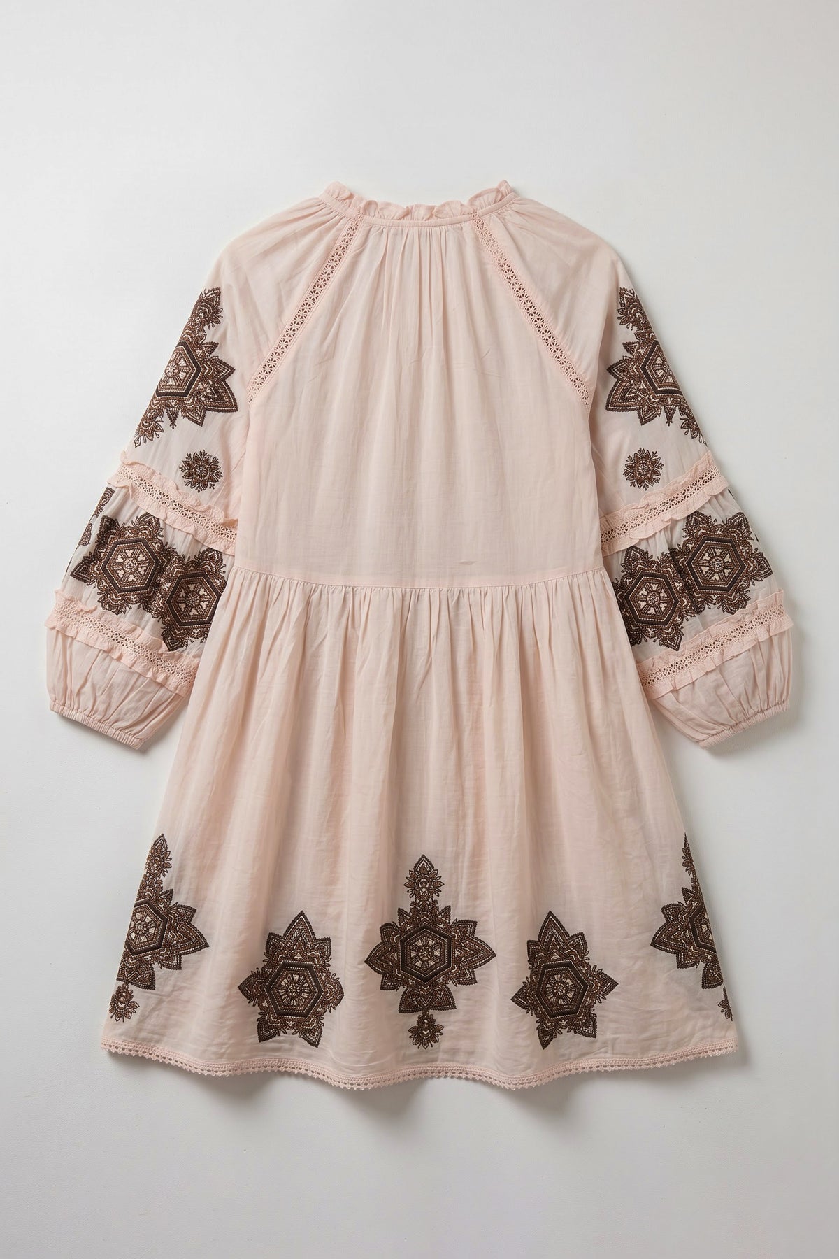 Hawaii geometric embroidered mini dress featuring a tie-up neckline, voluminous sleeves, lace trims and contrasting brown embroidery
