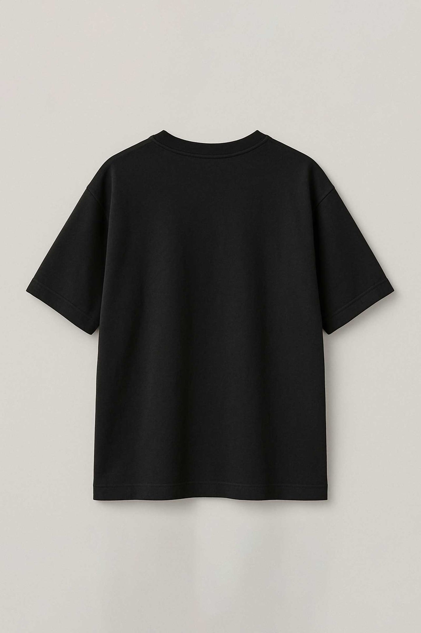 Black t-shirt on a light gray background