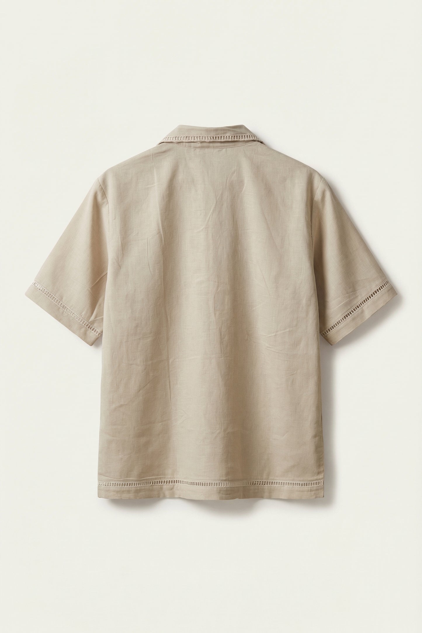 Beige polo shirt on a white background