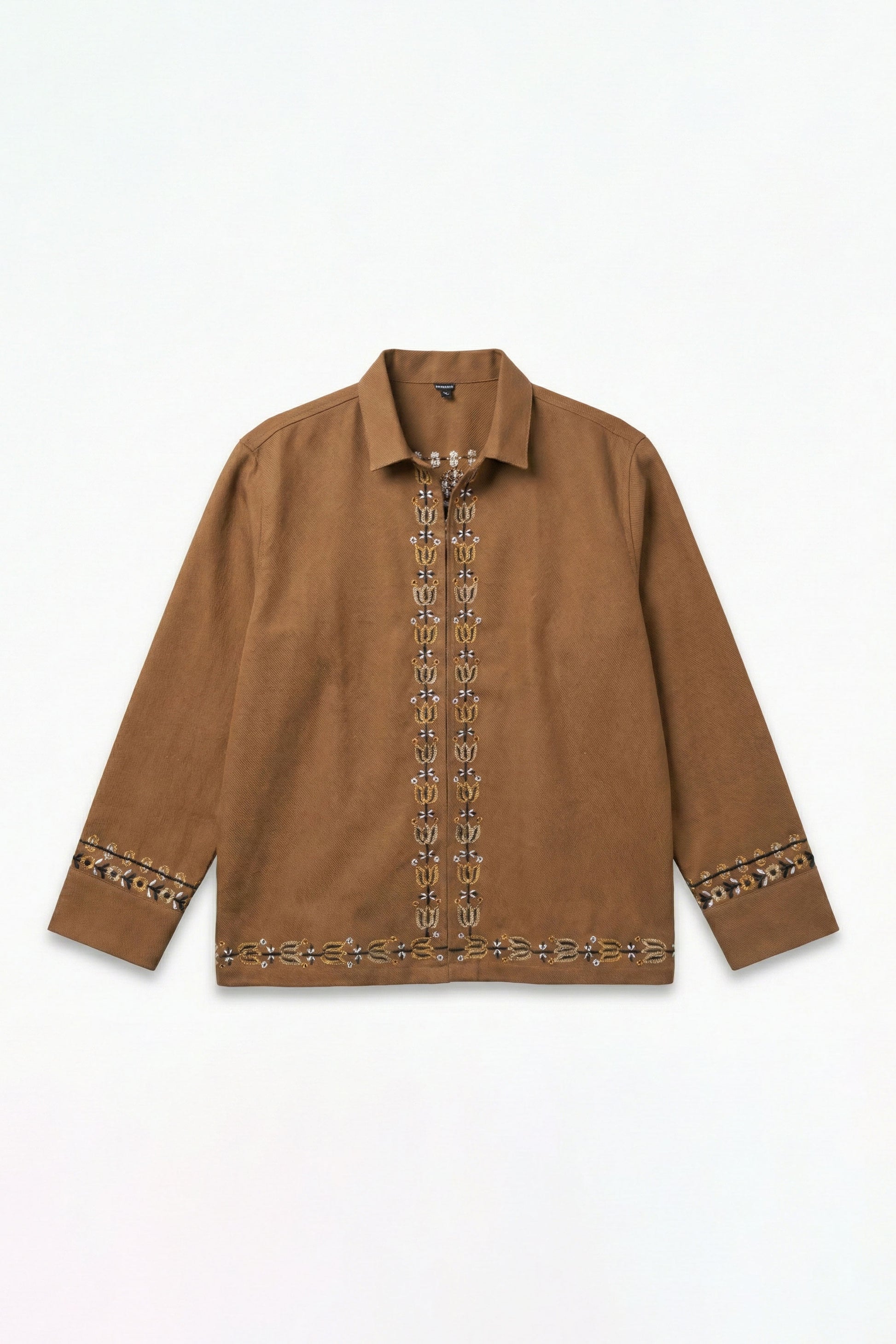 Brown shirt with decorative patterns on a white background