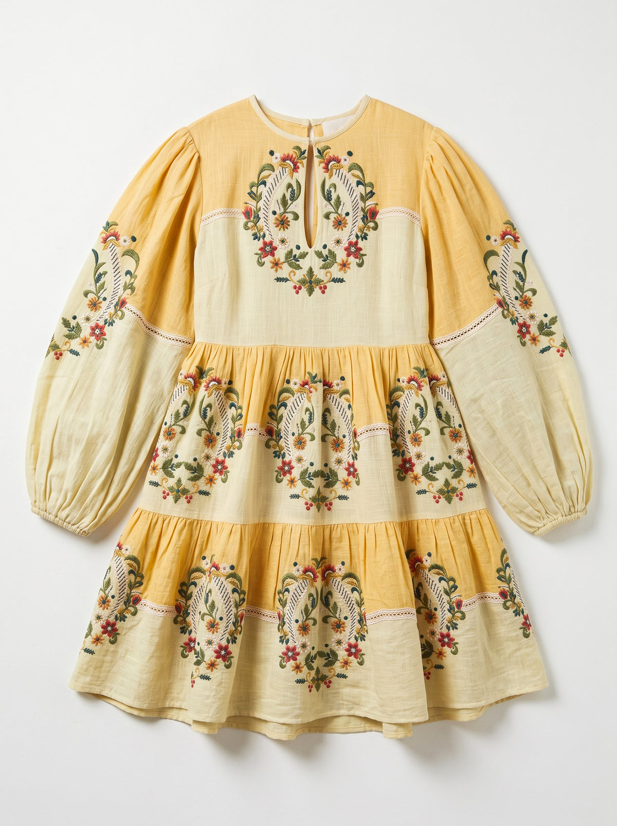 Aurora yellow and ivory cotton slub boho mini dress with multicolour floral embroidery, lace inserts, tiered skirt and open back
