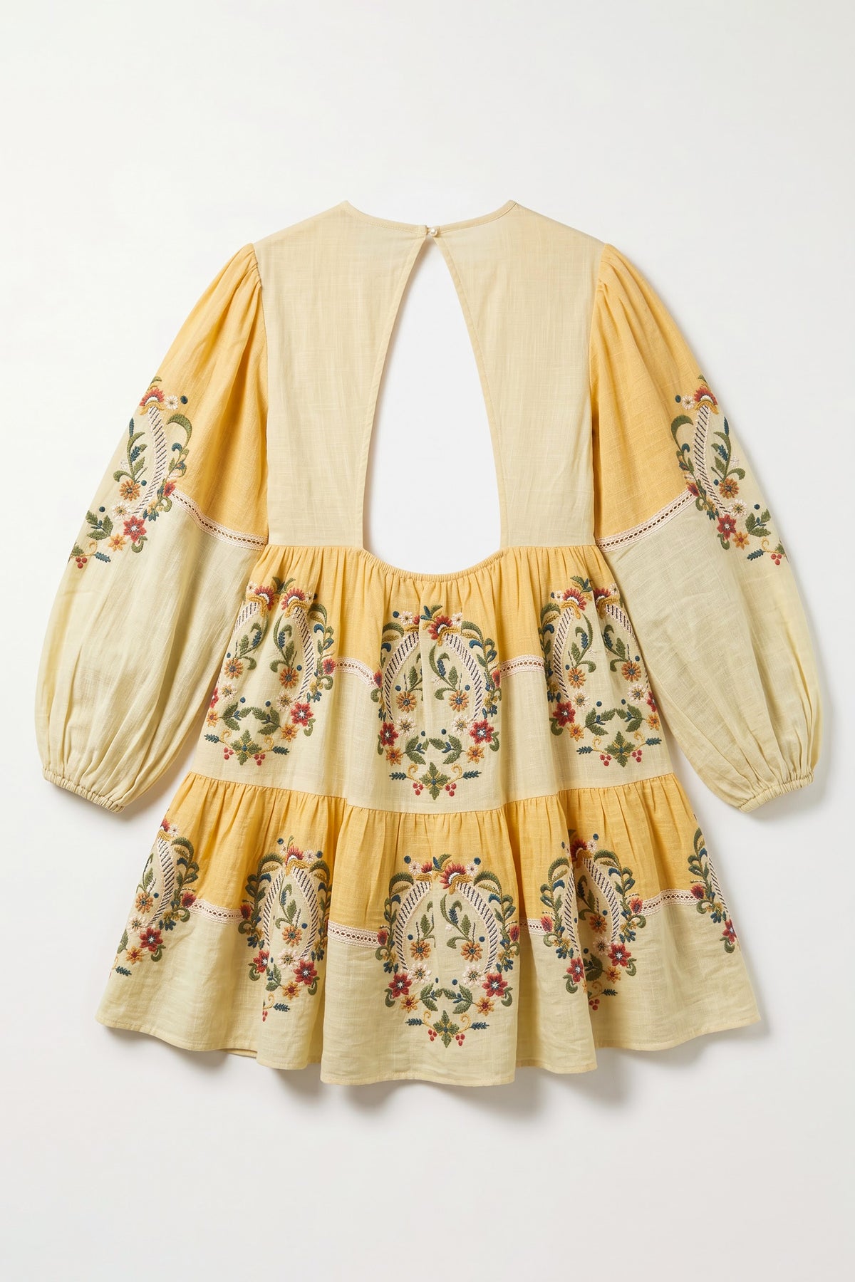 Aurora yellow and ivory cotton slub boho mini dress with multicolour floral embroidery, lace inserts, tiered skirt and open back