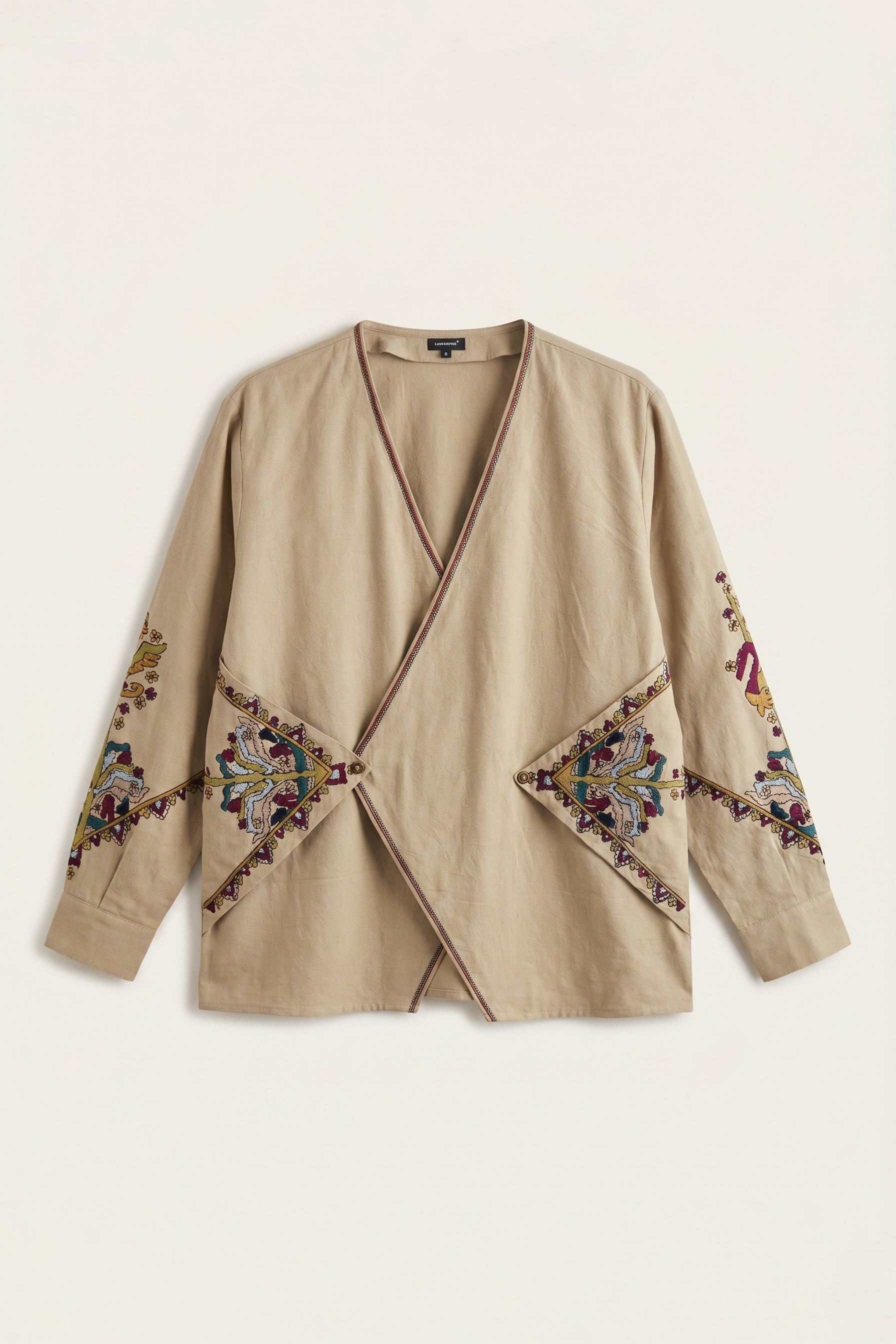 Beige cardigan with floral embroidery on a white background