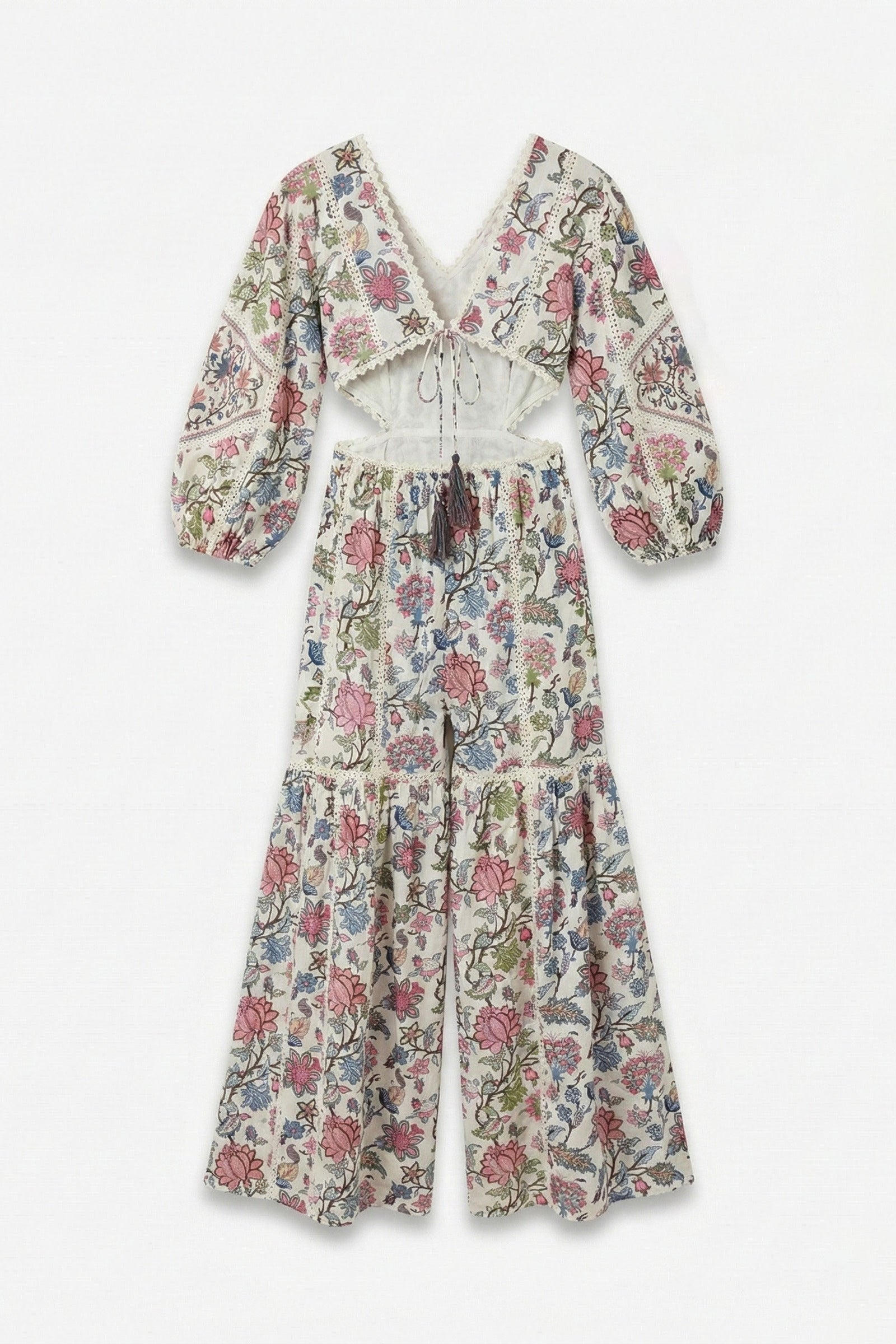 Floral patterned outfit with long sleeves and wide-leg pants on a white background