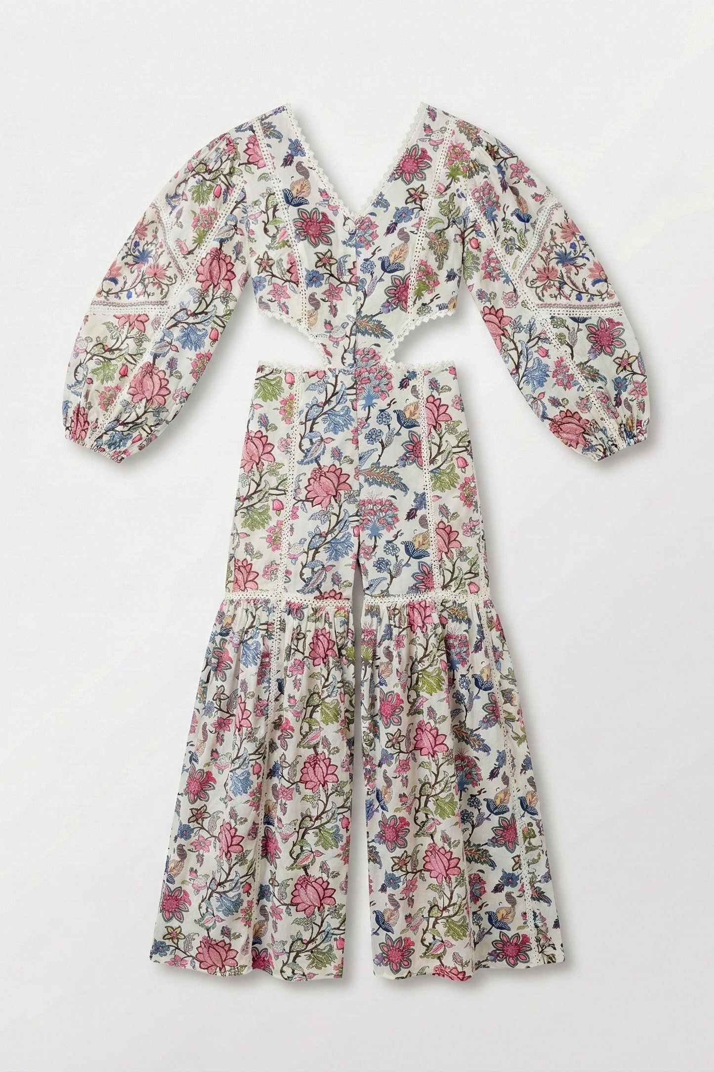 Floral print outfit with top and pants on a white background