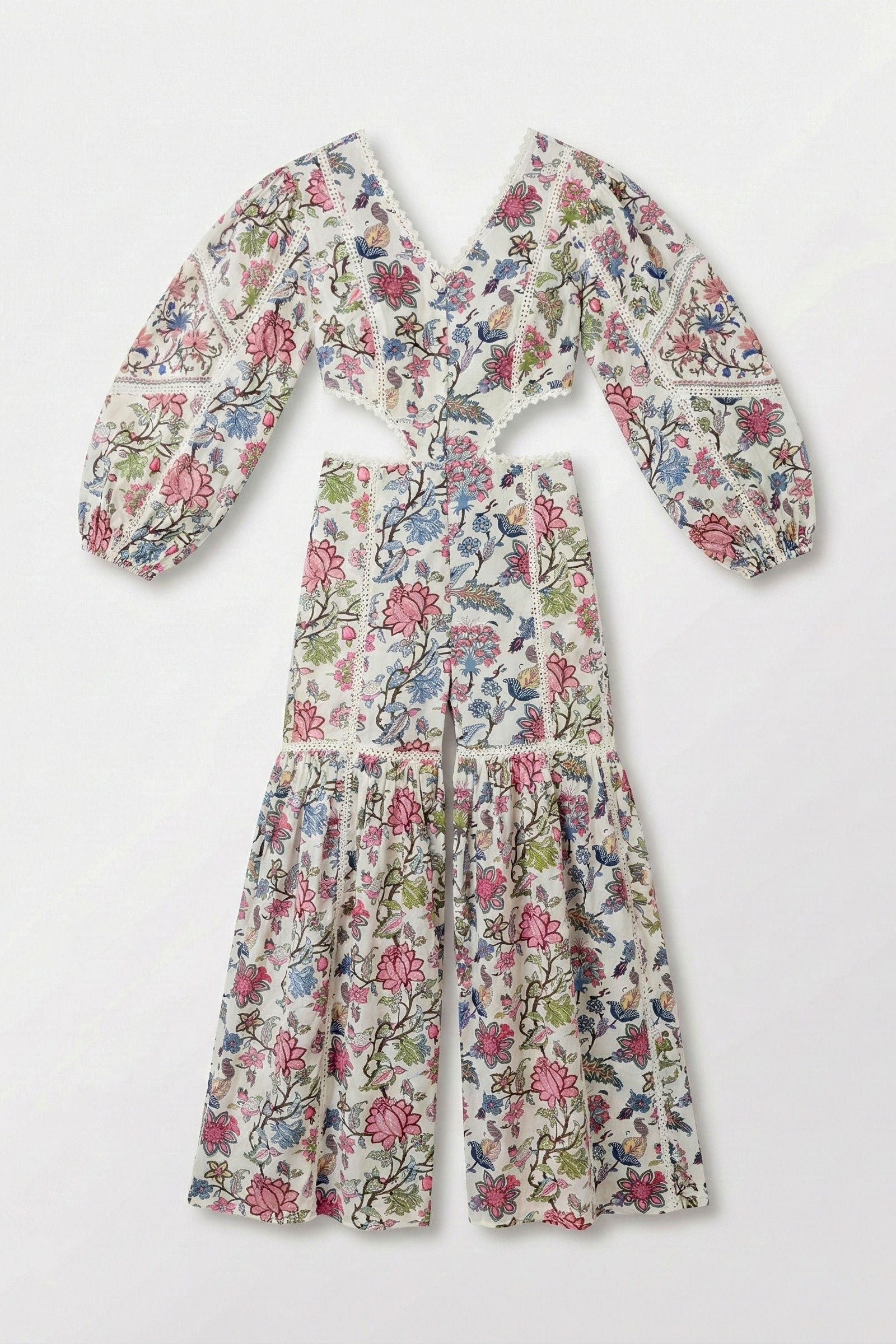 Floral print outfit with top and pants on a white background