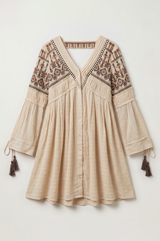 Bohemian Eleanor peach embroidered mini dress with geometric embroidery, lace inserts, ruffle detailing and tassel cuffs