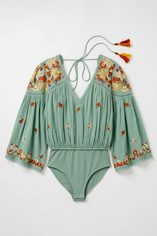 Teal green rayon Embroidered Fairy Bodysuit with multicolour floral embroidery, lace detailing, statement sleeves and open-back tassels