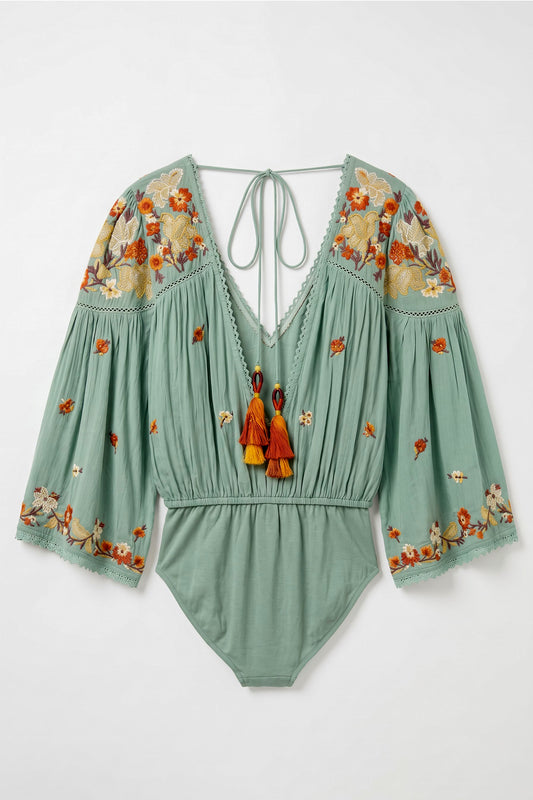 Teal green rayon Embroidered Fairy Bodysuit with multicolour floral embroidery, lace detailing, statement sleeves and open-back tassels