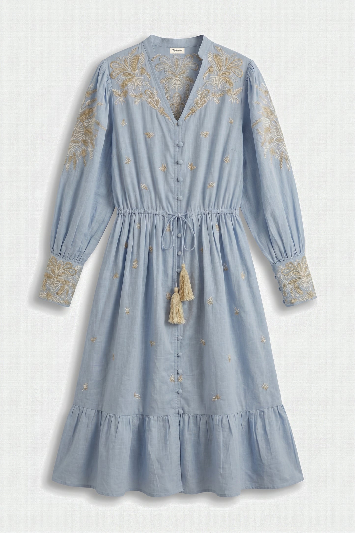 Blue dress with floral embroidery on a white background