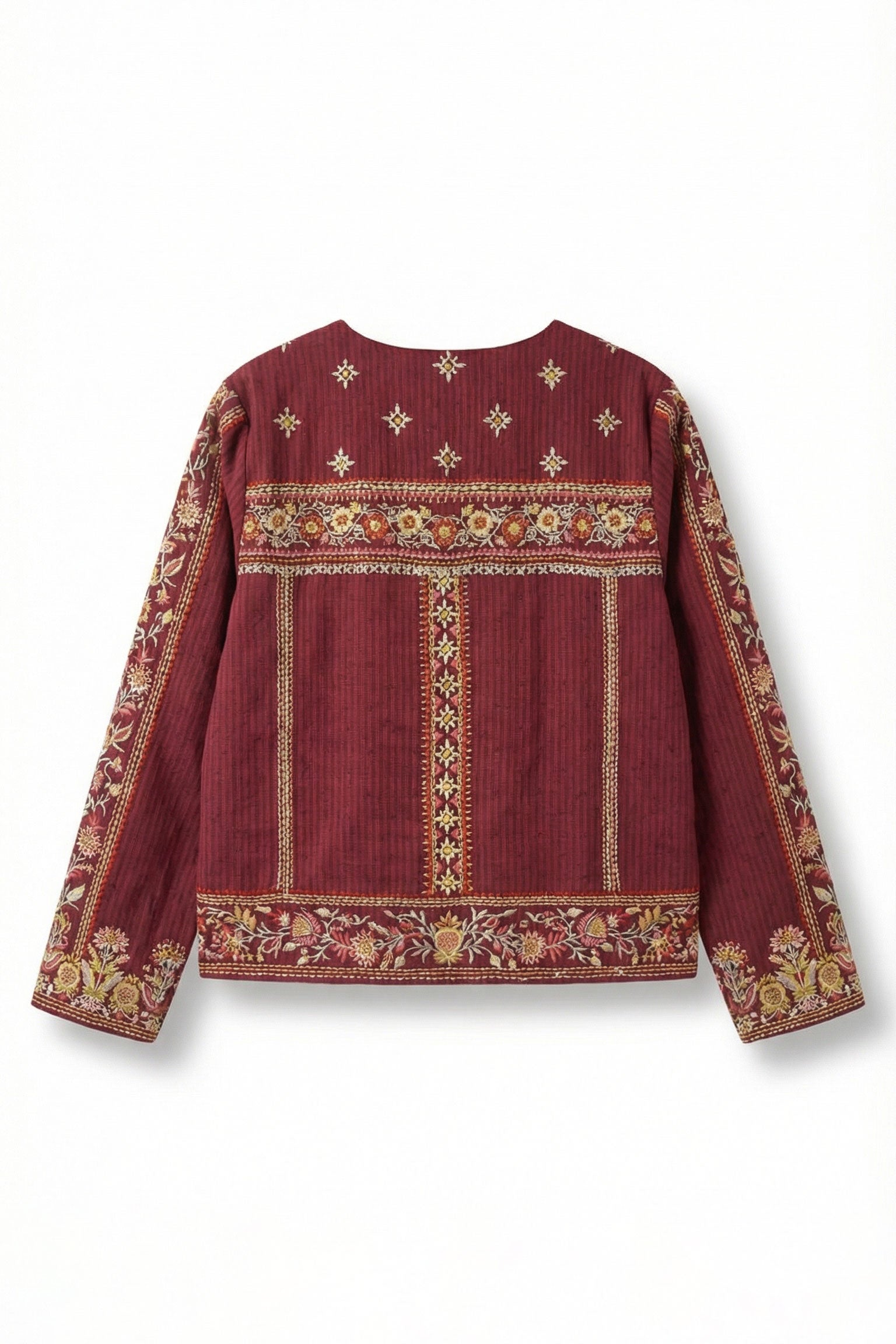 Red embroidered blouse on a white background