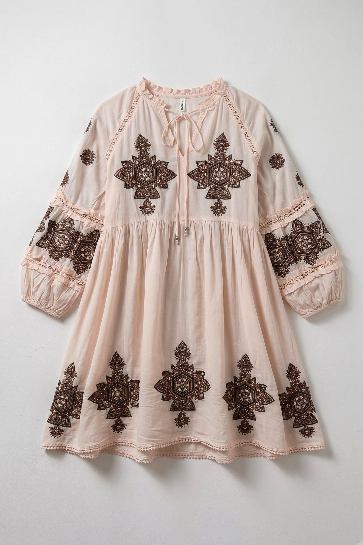 Hawaii geometric embroidered mini dress featuring a tie-up neckline, voluminous sleeves, lace trims and contrasting brown embroidery