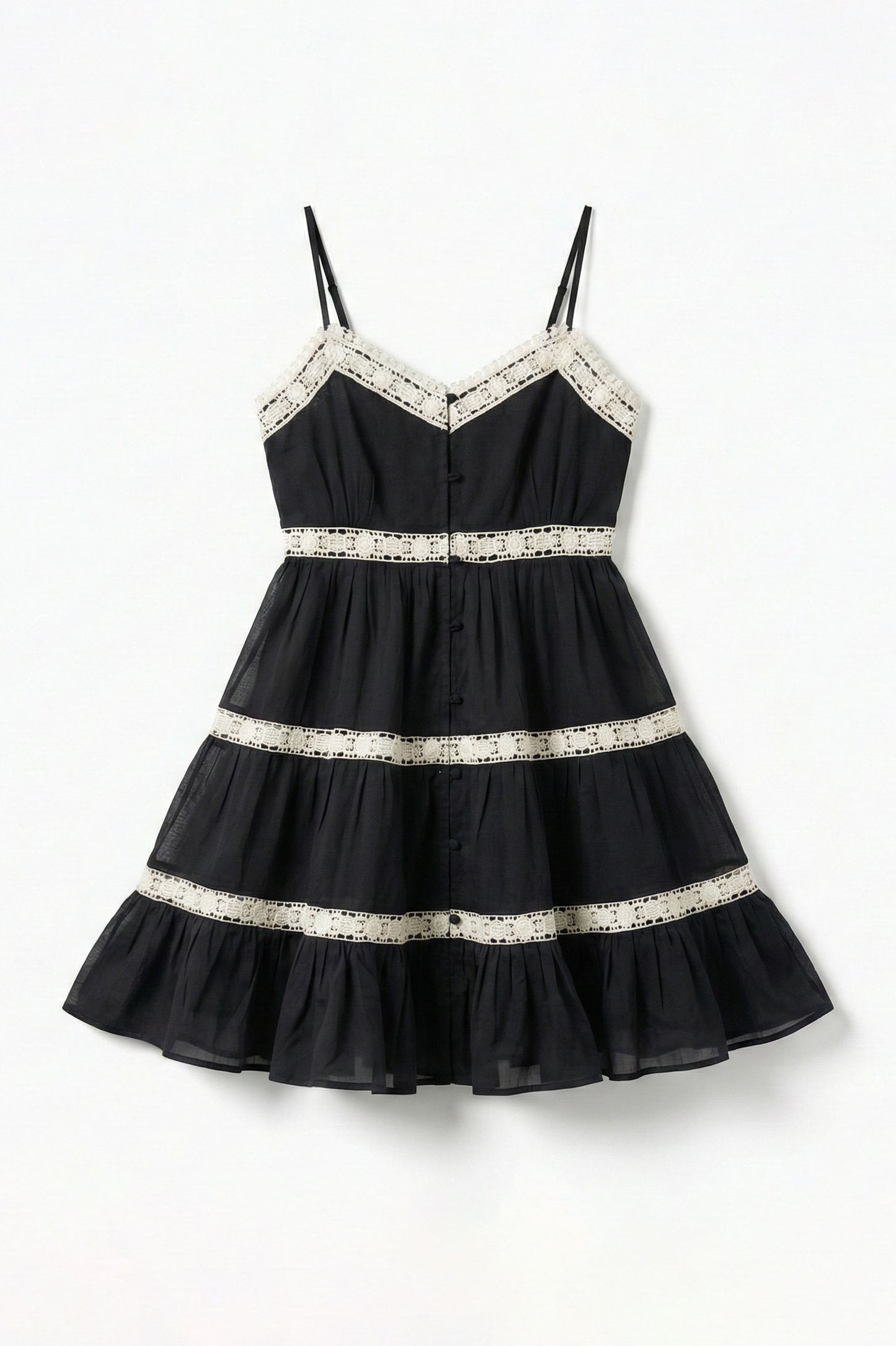 Black dress with lace details on a white background