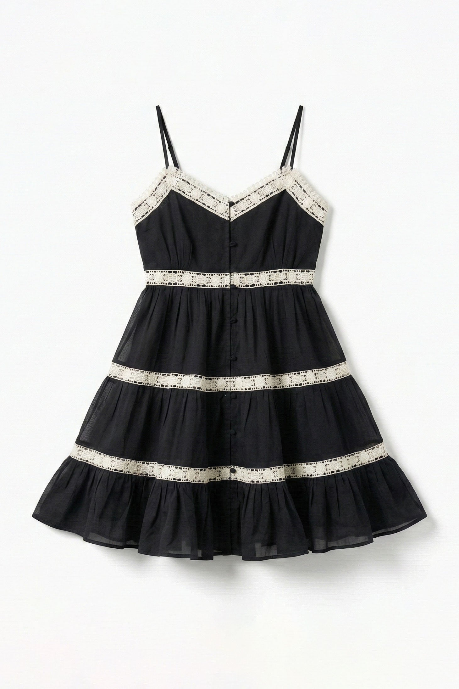 Black dress with lace details on a white background