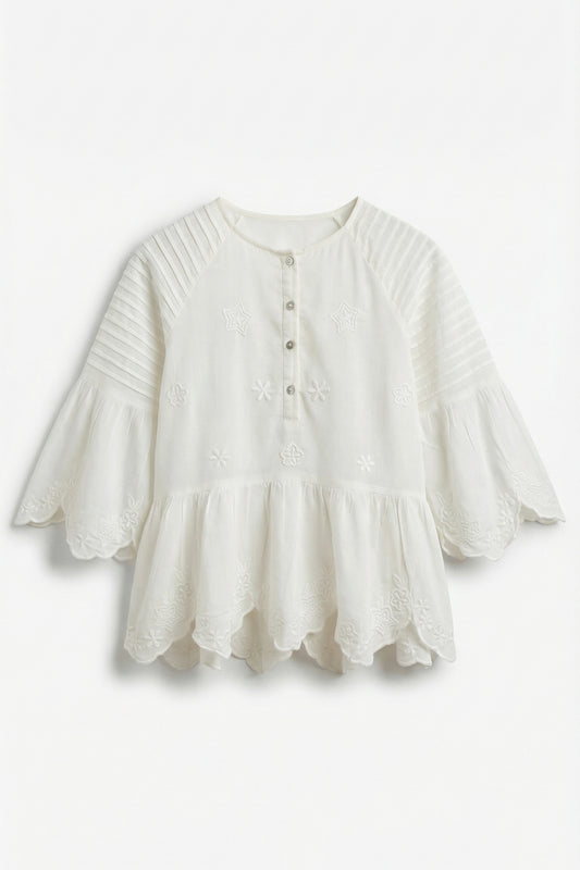 White blouse with ruffled sleeves on a white background