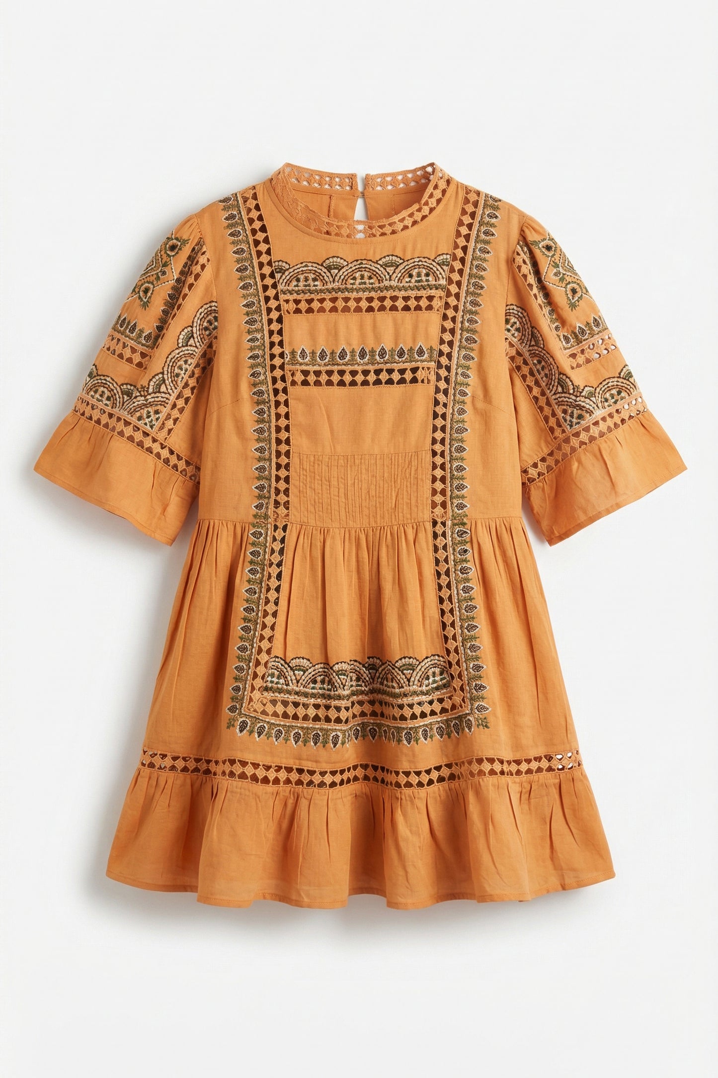 Orange dress with intricate black patterns on a white background