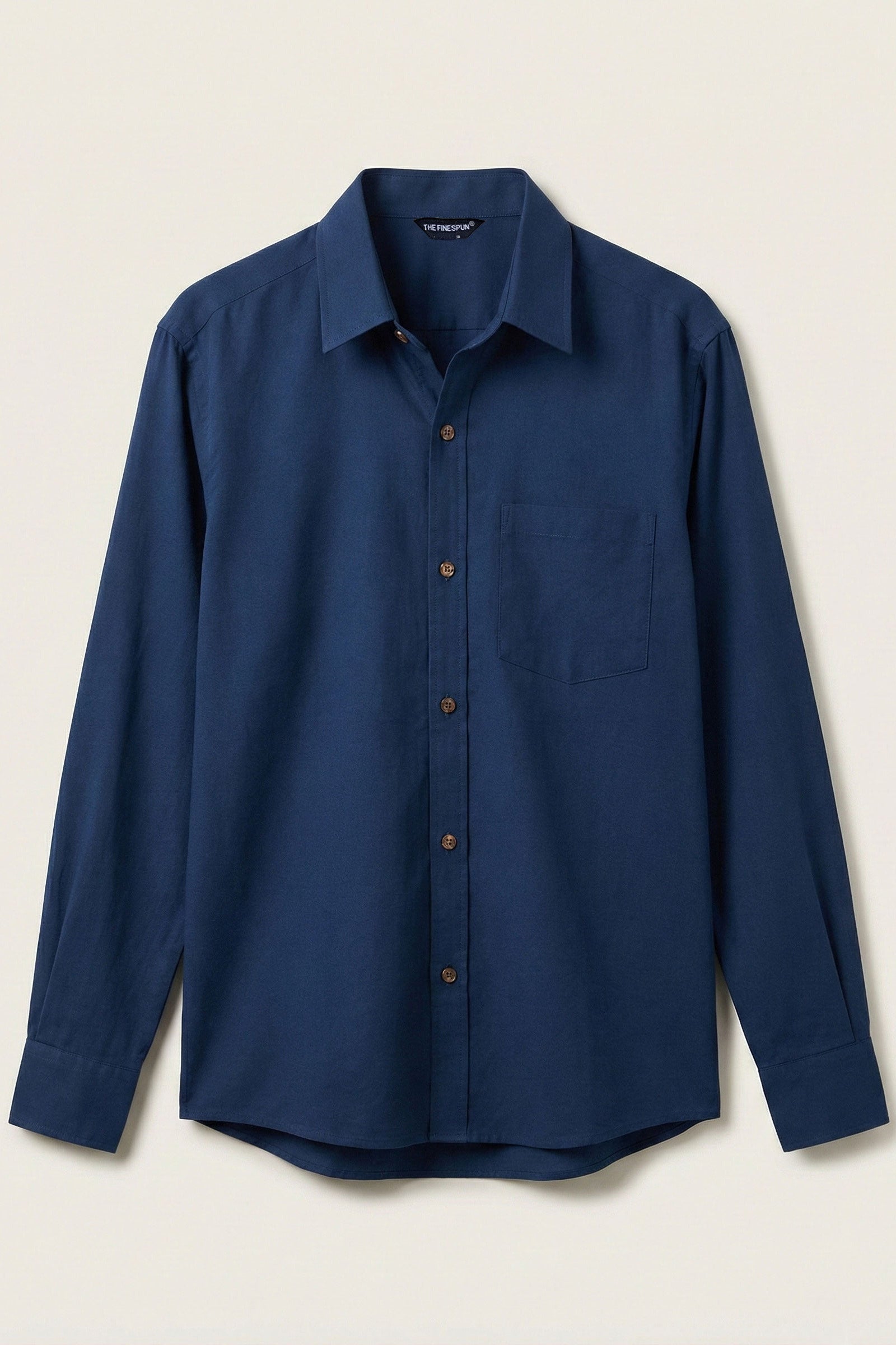 Blue shirt on a beige background