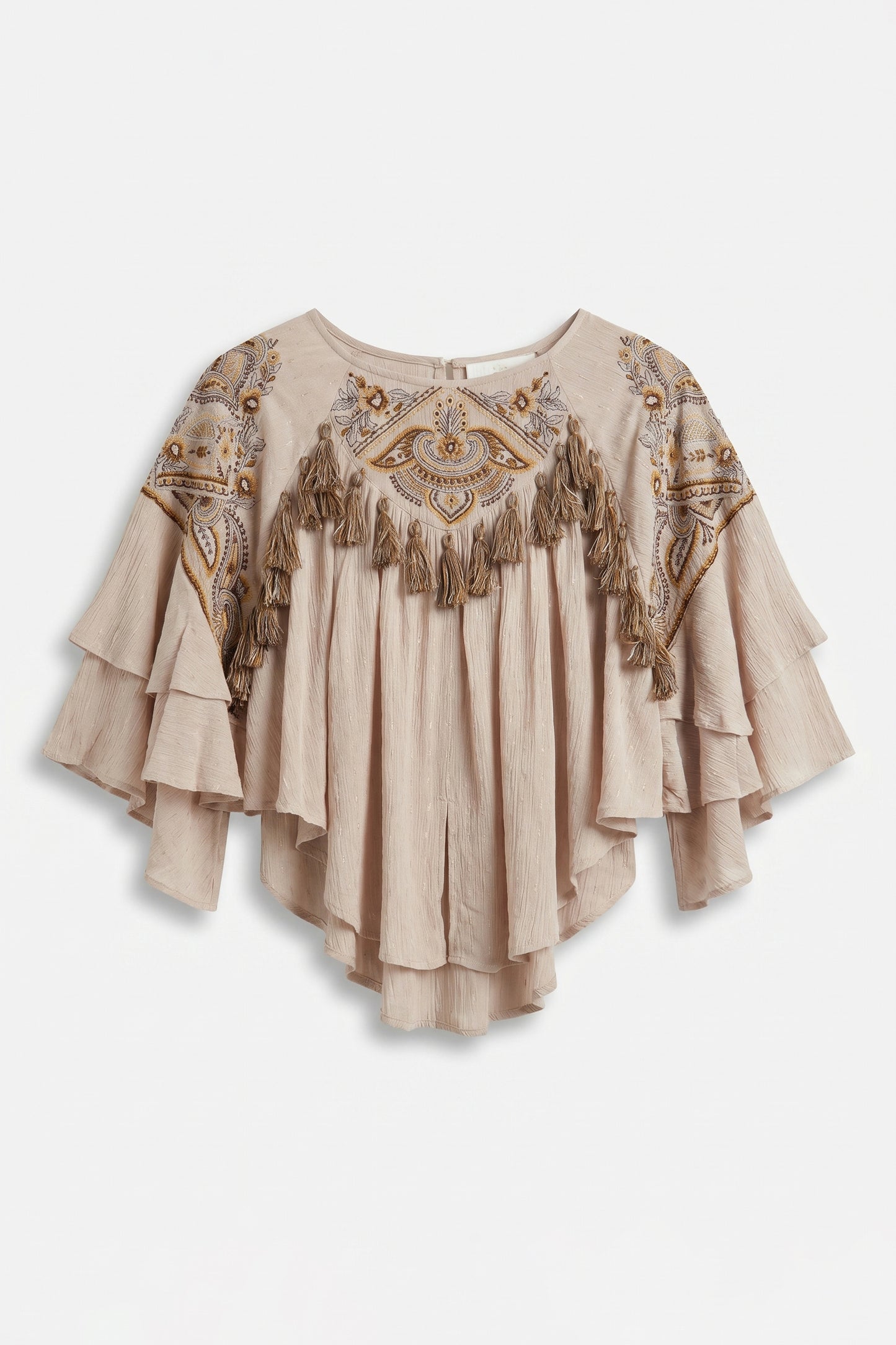 Beige blouse with intricate patterns and tassels on a white background