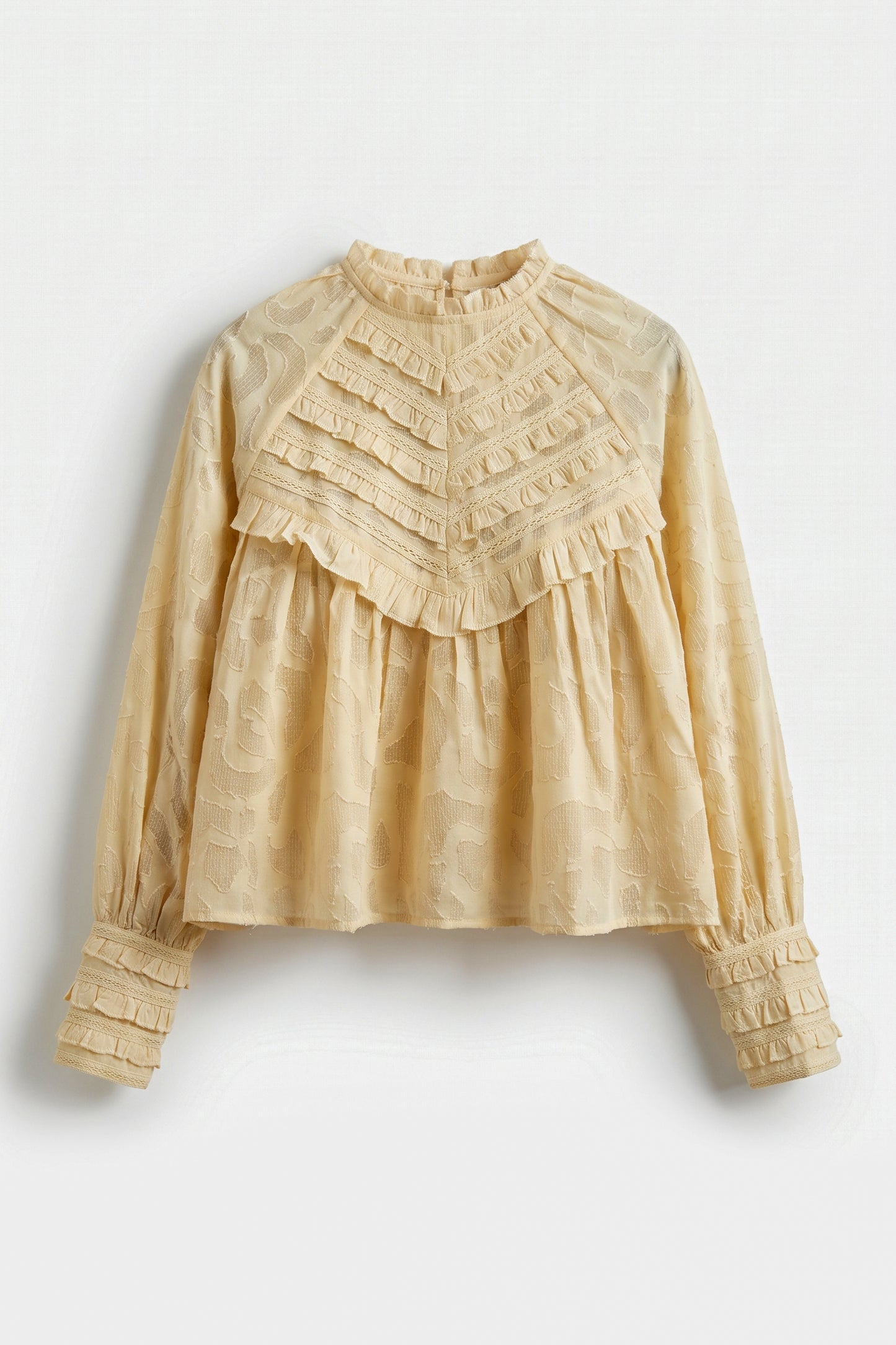 Renata Backless Top for women in sand viscose georgette jacquard featuring lace detailing, ruffle yoke, high neckline, bishop sleeves, and a relaxed boho silhouette.