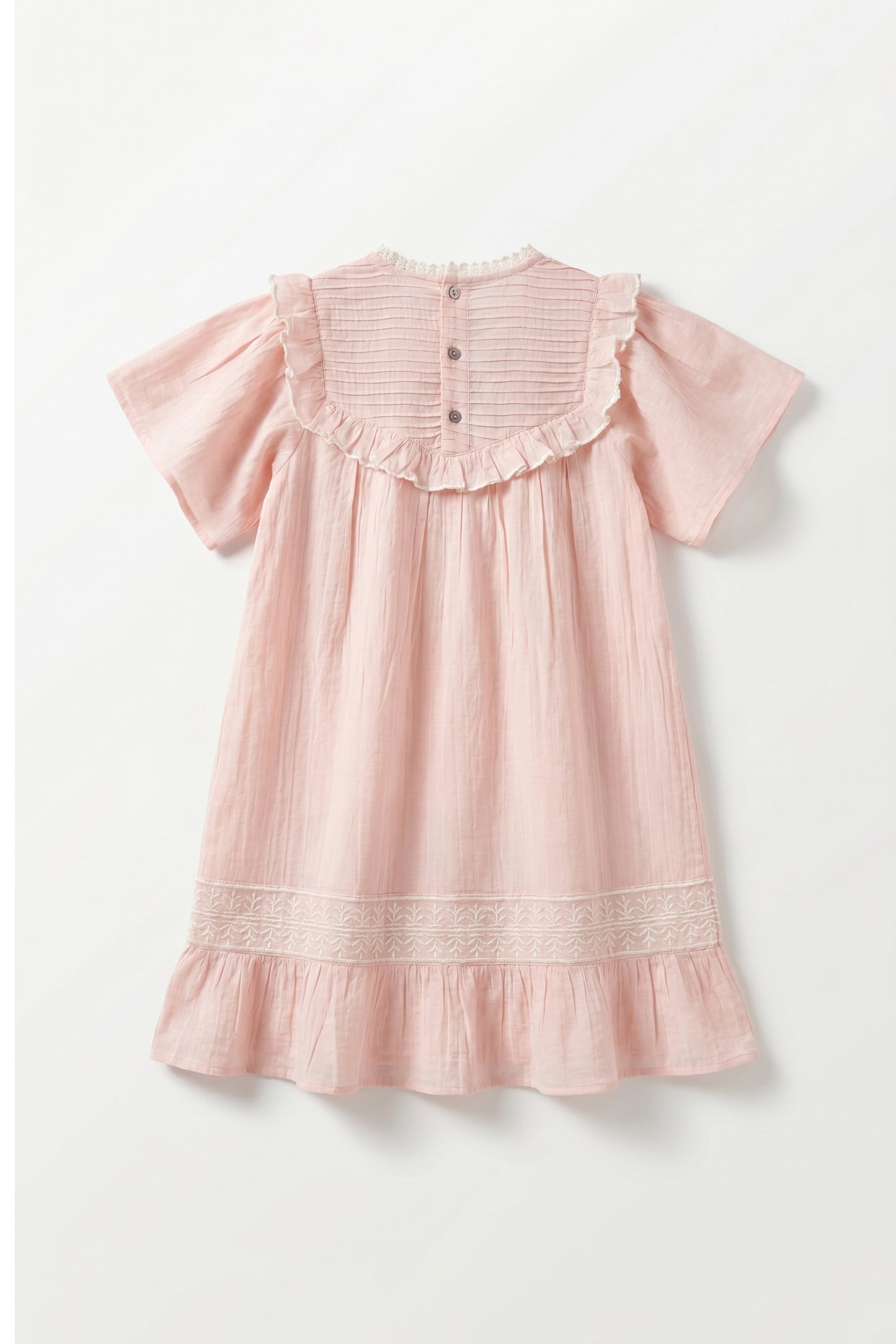 Pink dress with ruffled sleeves and hem on a white background