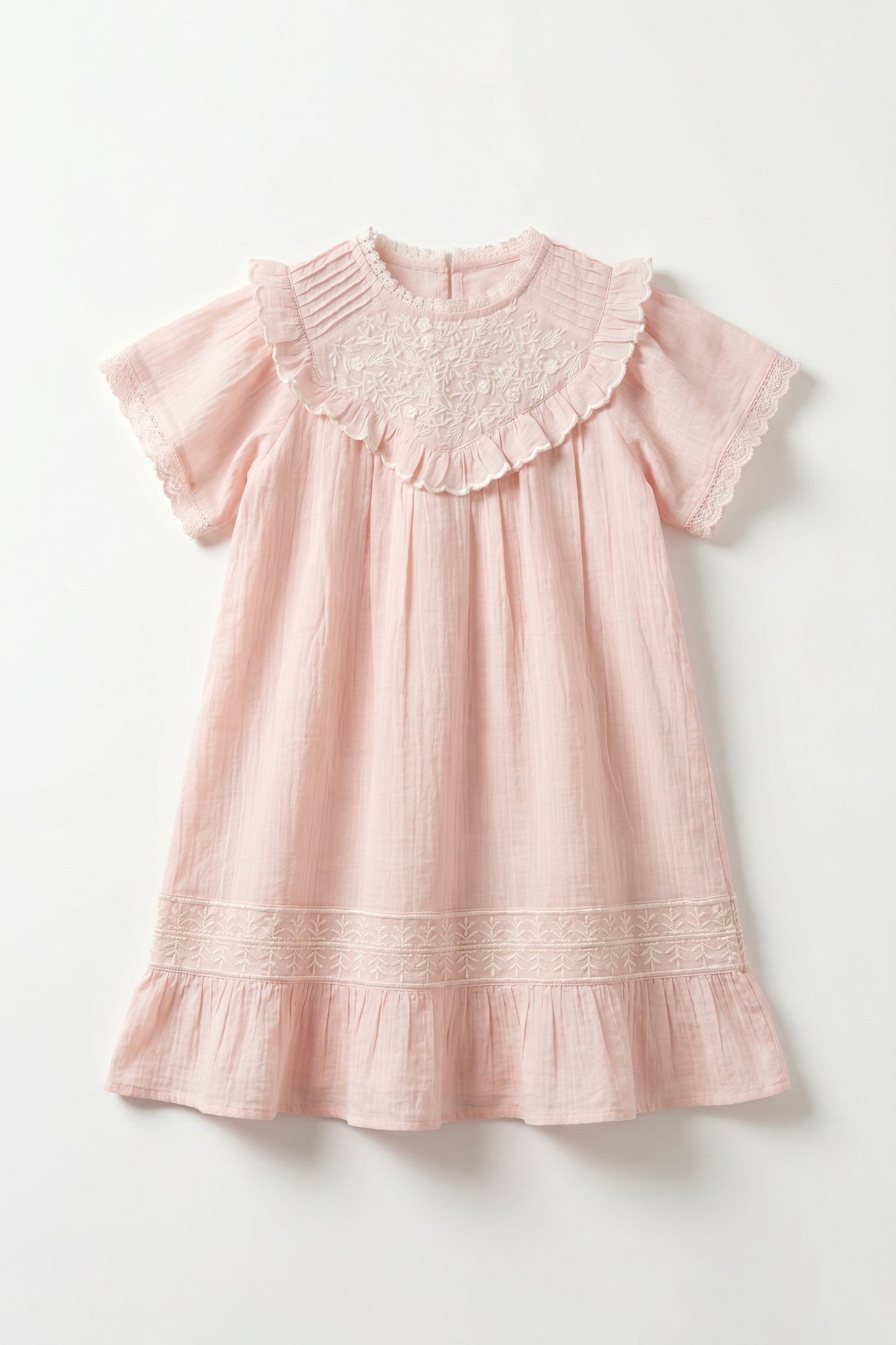 Pink dress with lace neckline on a white background