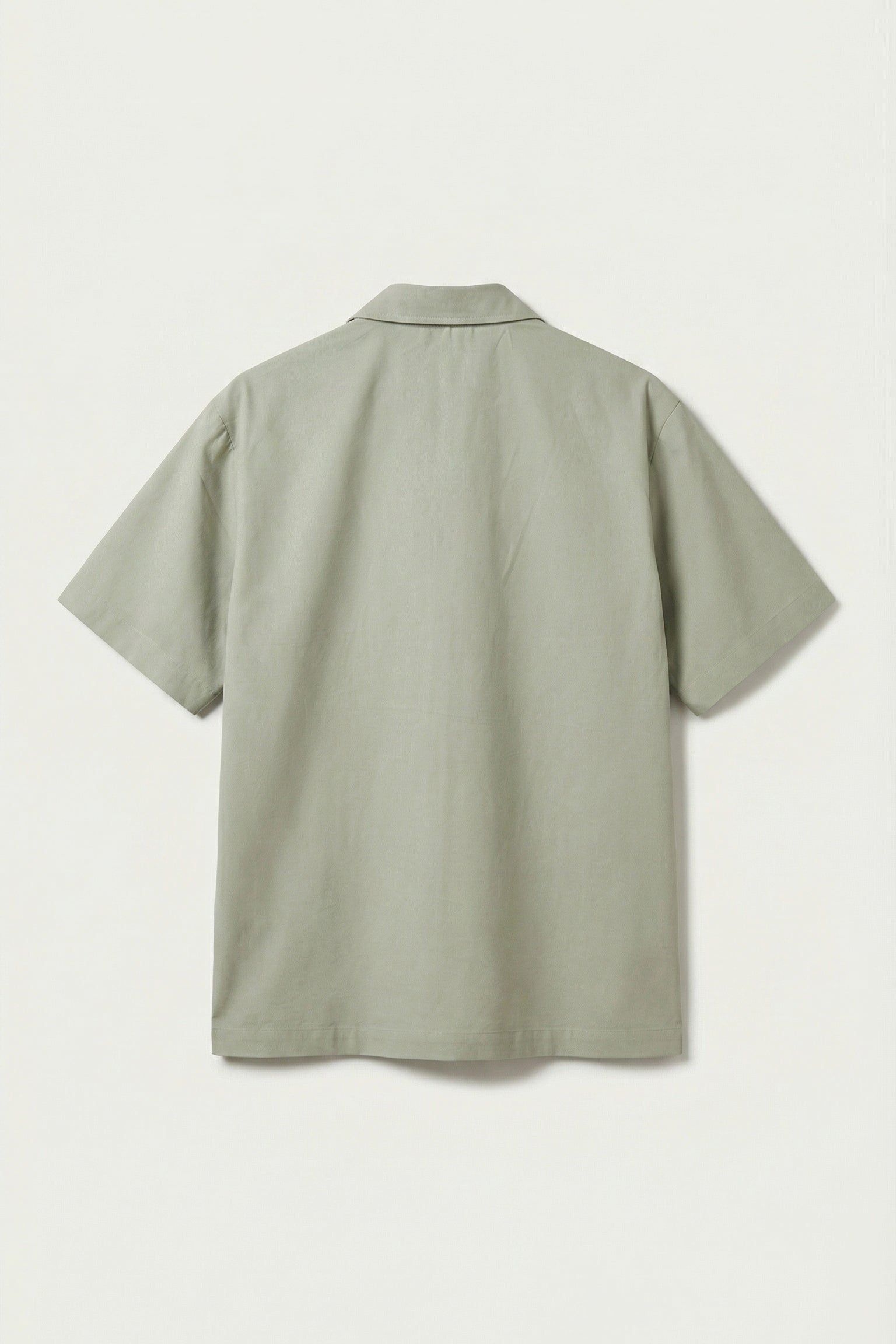 Light green shirt on a white background