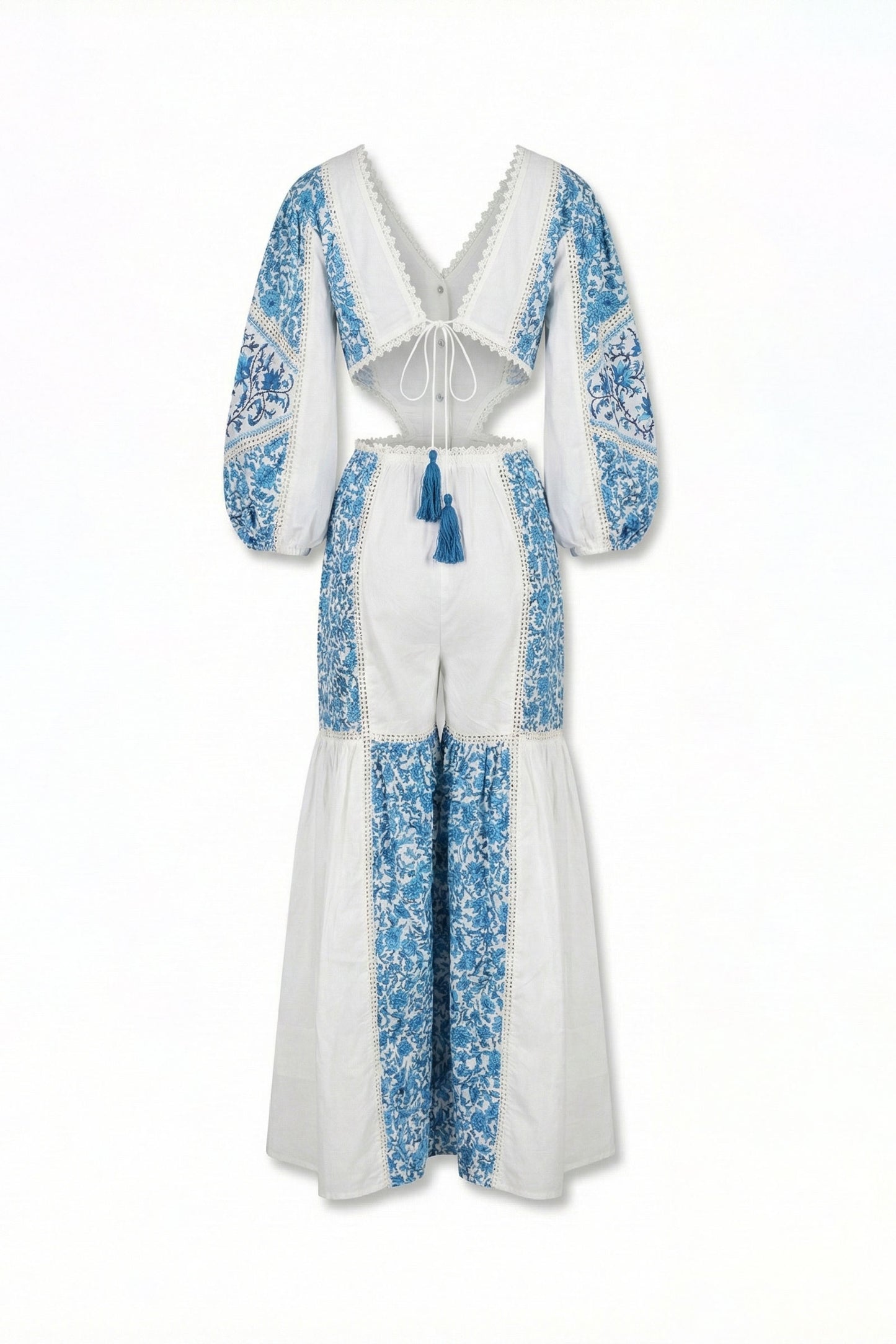 White dress with blue floral patterns on a white background