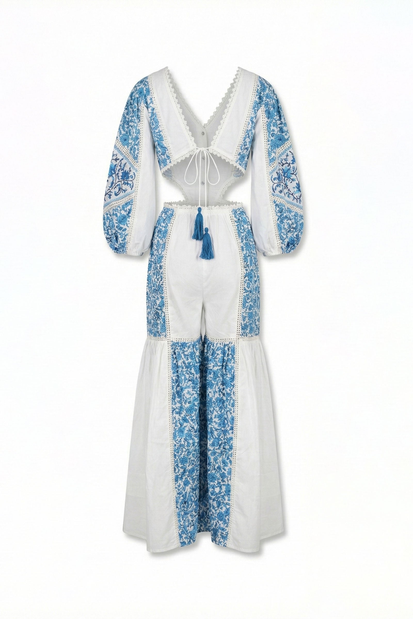 White dress with blue floral patterns on a white background