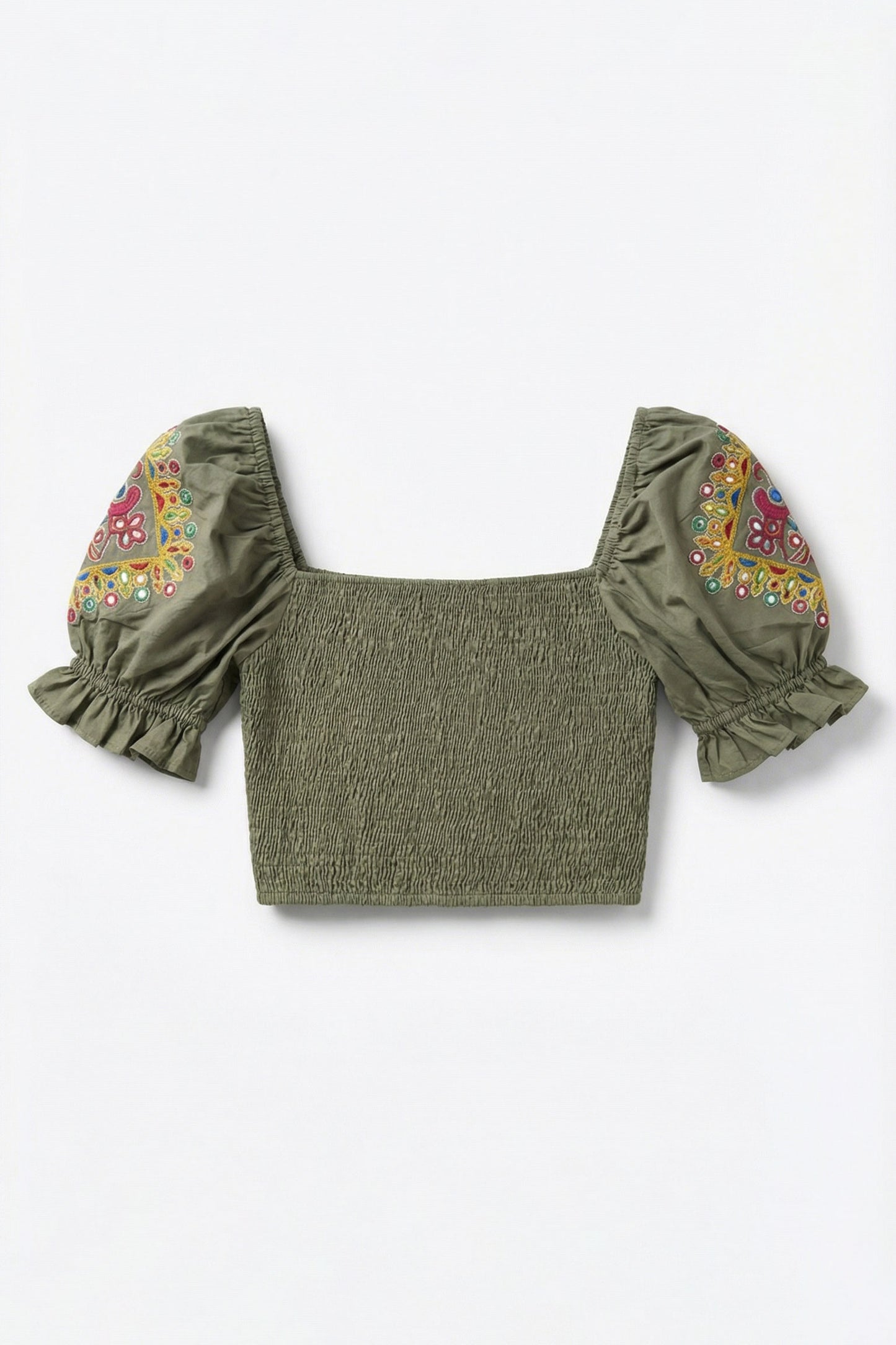 Green top with floral sleeves on a white background
