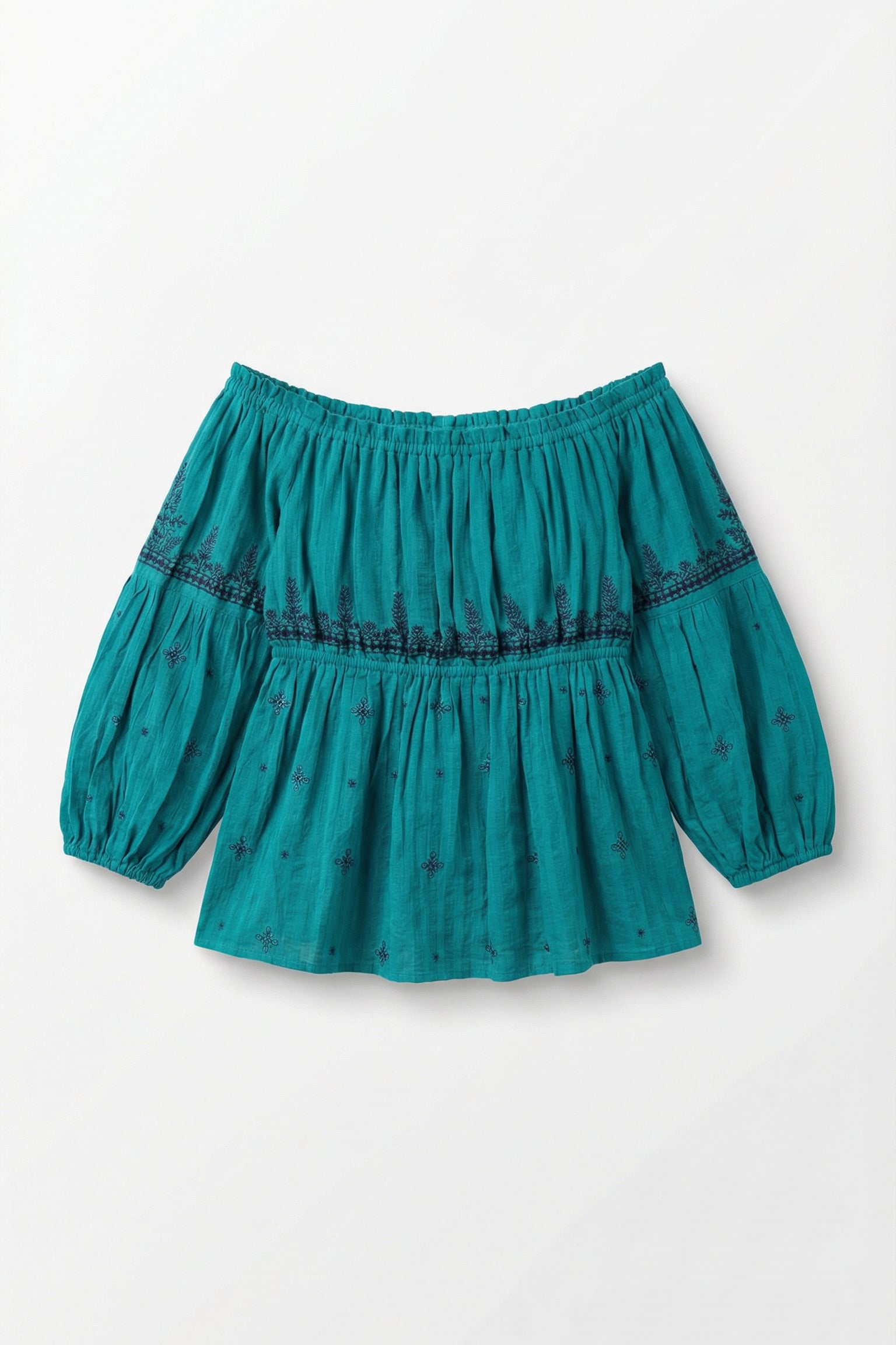 Teal blouse with puff sleeves on a white background