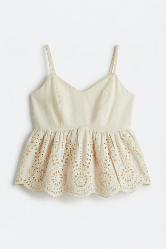 Beige lace-trimmed top on a white background