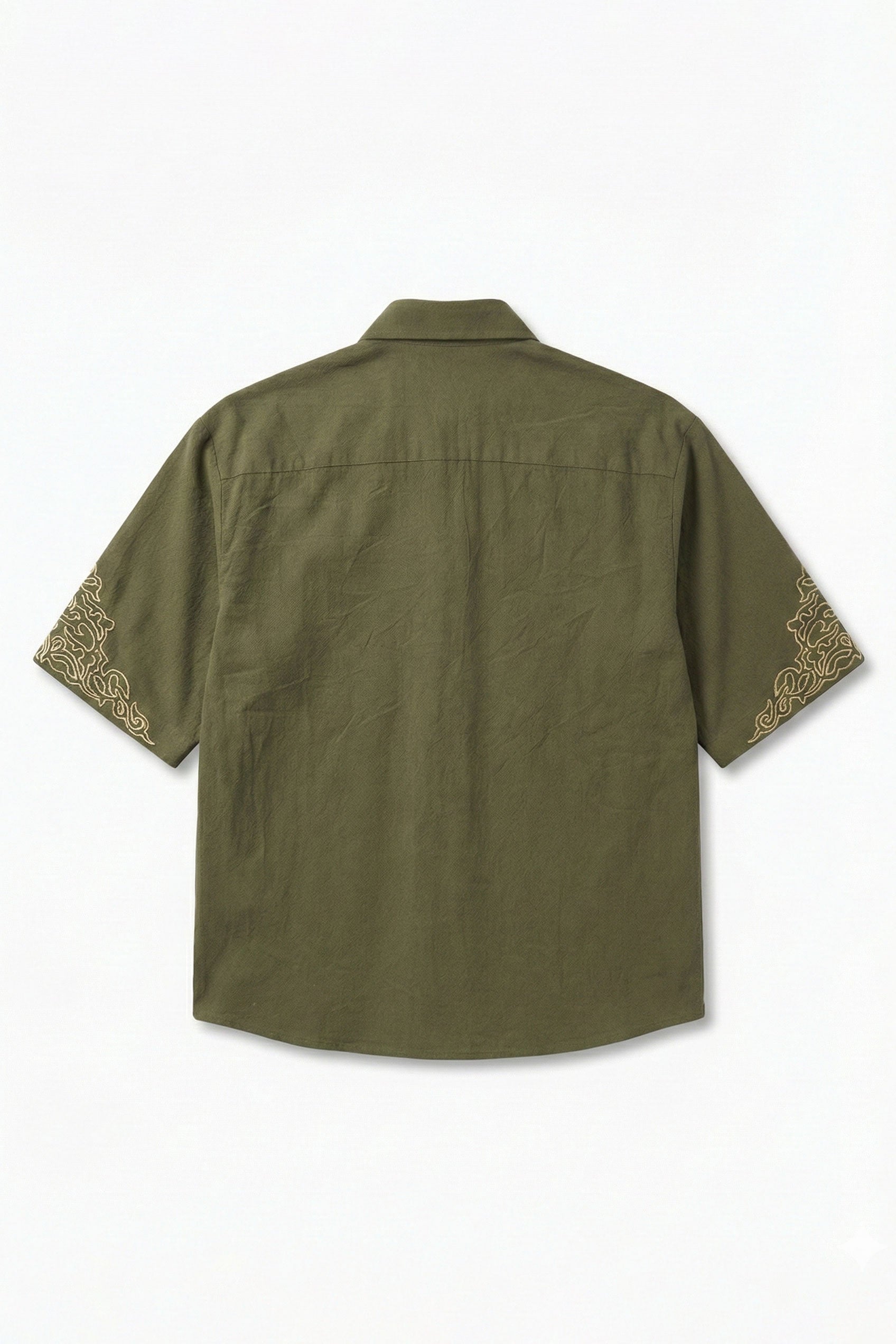 Green shirt with embroidery on sleeves on a white background