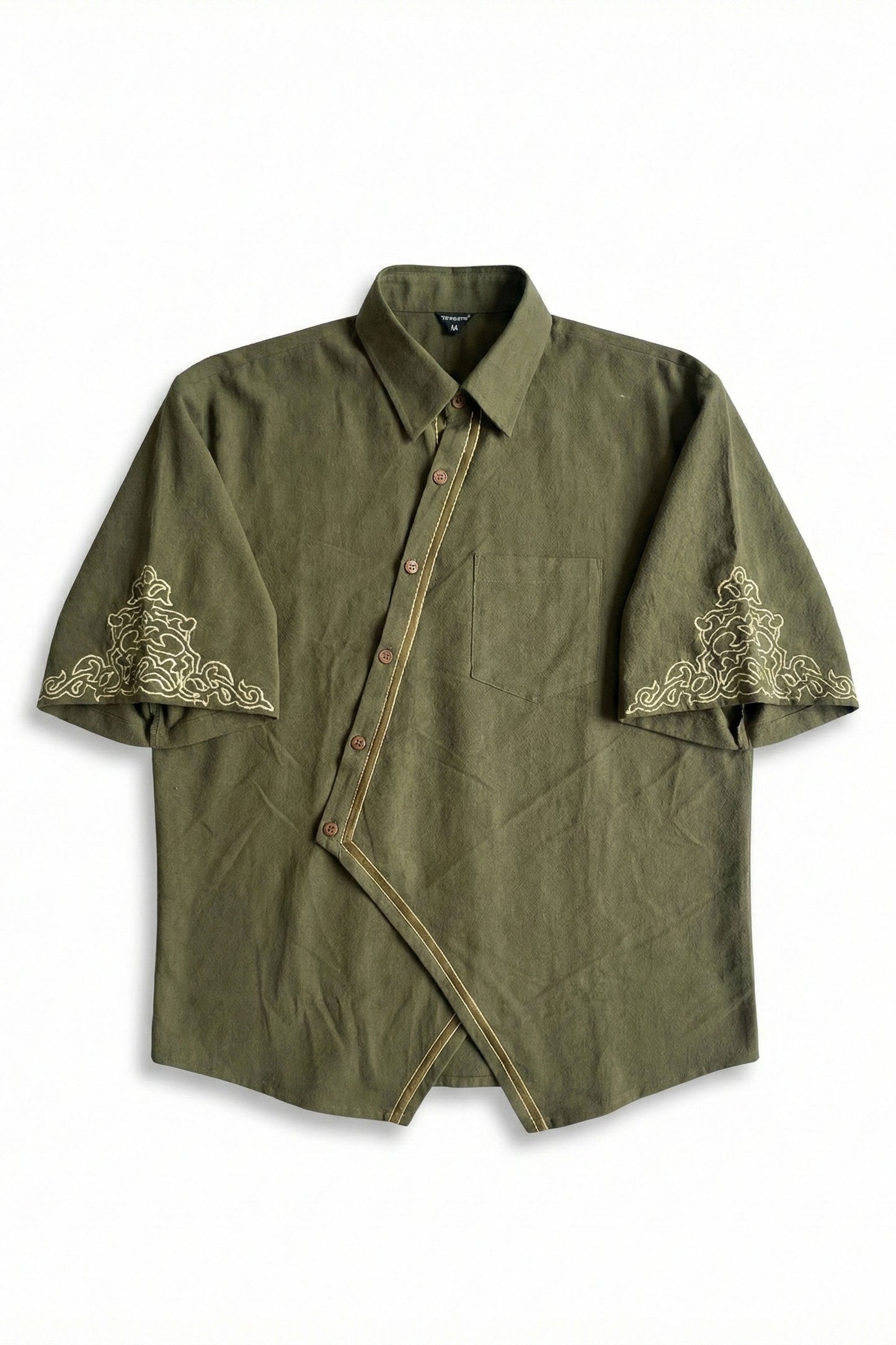 Green shirt with embroidery on sleeves and collar against a white background