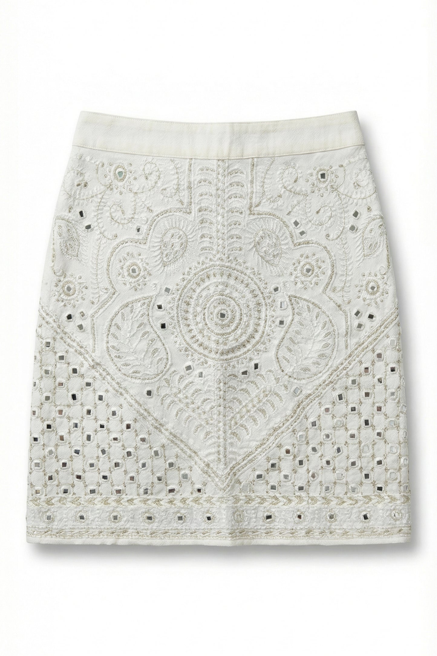 White lace skirt with intricate patterns on a white background