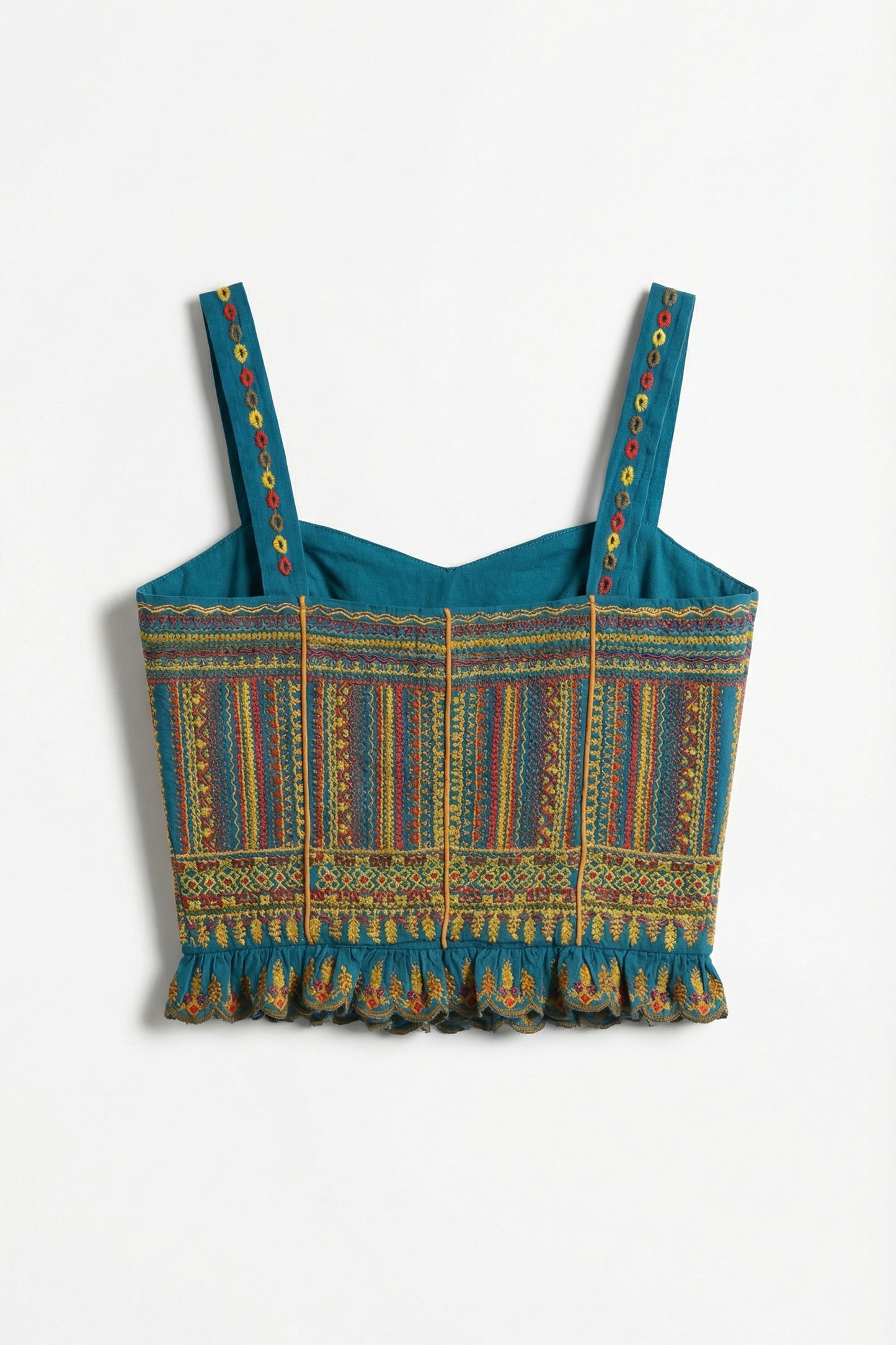 Blue patterned crop top with colorful straps on a white background